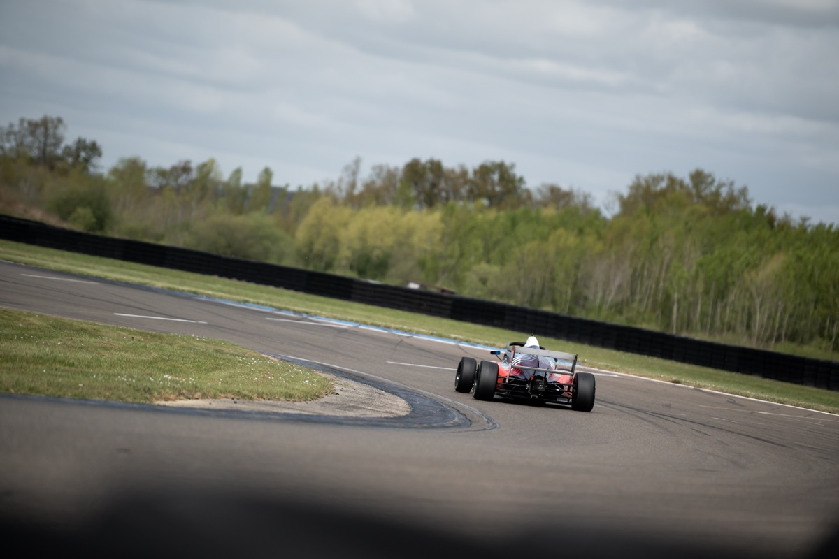 Jack Iliffe F4 car exiting a corner on circuit
