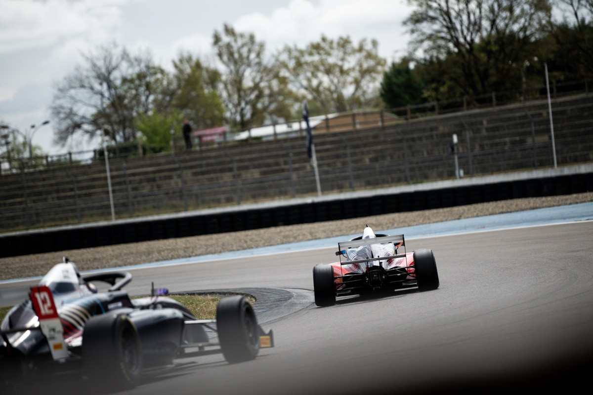 Two F4 cars battling on track at the FFSA Championship
